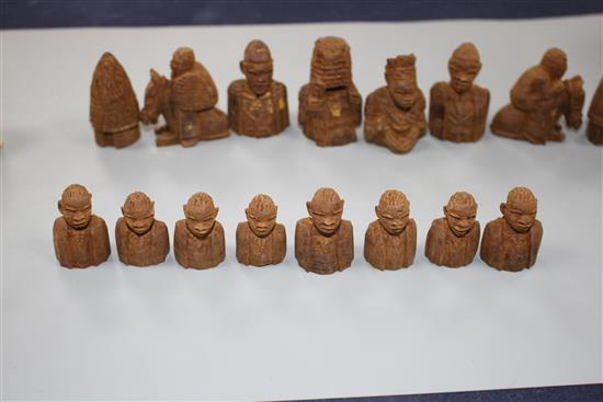 An East African carved wood chess set, kings 5cm, in carved hardwood box, possibly from The Cameroon